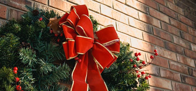 holiday wreath with giant red bow