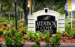 Exterior shot of the sign at Audubon Cove in Florida